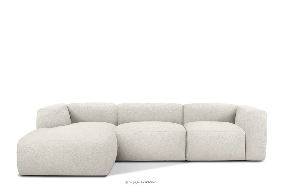 BUFFO Veľká mäkká rohová pohovka z bouclé tkaniny ľavá strana biela bílá - obrázok 0